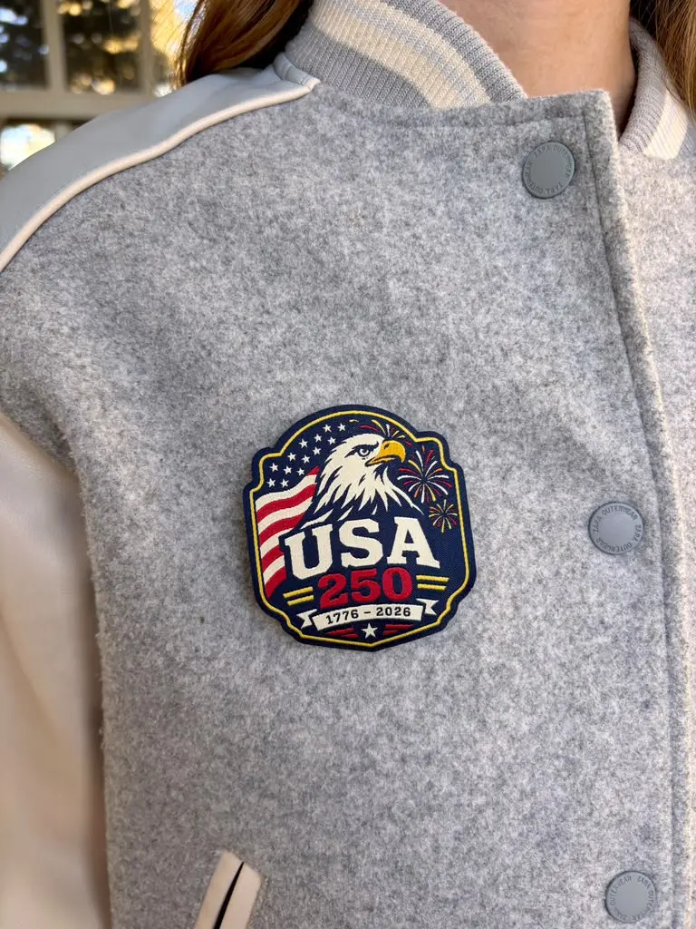 USA woven patch applied to a gray coat