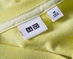 Woven label on yellow garment